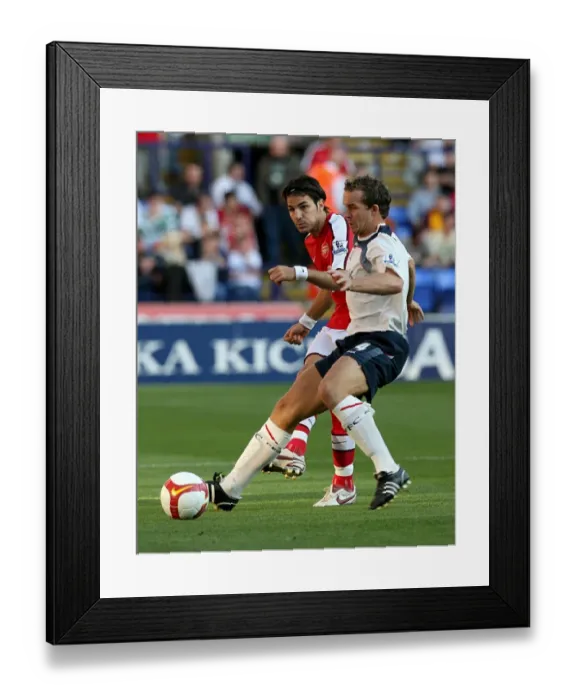Framed Print : Fabregas vs. Davies: Intense Battle for Ball Possession - Arsenal vs. Bolton Wanderers, Premier League 2008-09 Framed Print : Fabregas vs. Davies: Intense Battle for Ball Possession - Arsenal vs. Bolton Wanderers, Premier League 2008-09