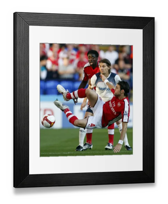 Framed Print : Arsenal's Fabregas Fends Off Bolton: A Premier League Showdown Framed Print : Arsenal's Fabregas Fends Off Bolton: A Premier League Showdown