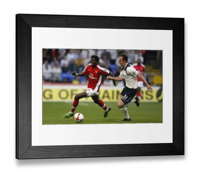 Framed Print : Adebayor vs. O'Brien: Intense Rivalry on the Soccer Field (Bolton vs. Arsenal, 2008-09) Framed Print : Adebayor vs. O'Brien: Intense Rivalry on the Soccer Field (Bolton vs. Arsenal, 2008-09)
