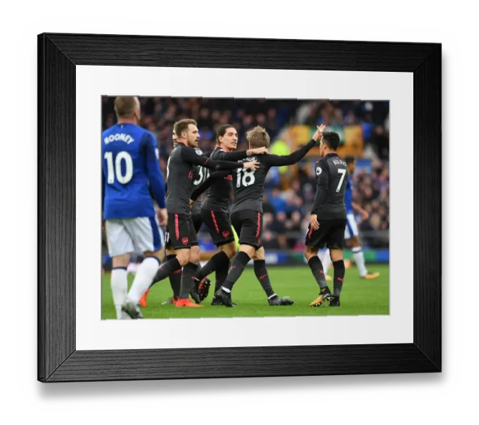 Framed Print : Monreal, Bellerin, and Ramsey Celebrate Arsenal's First Goal Against Everton (2017-18)