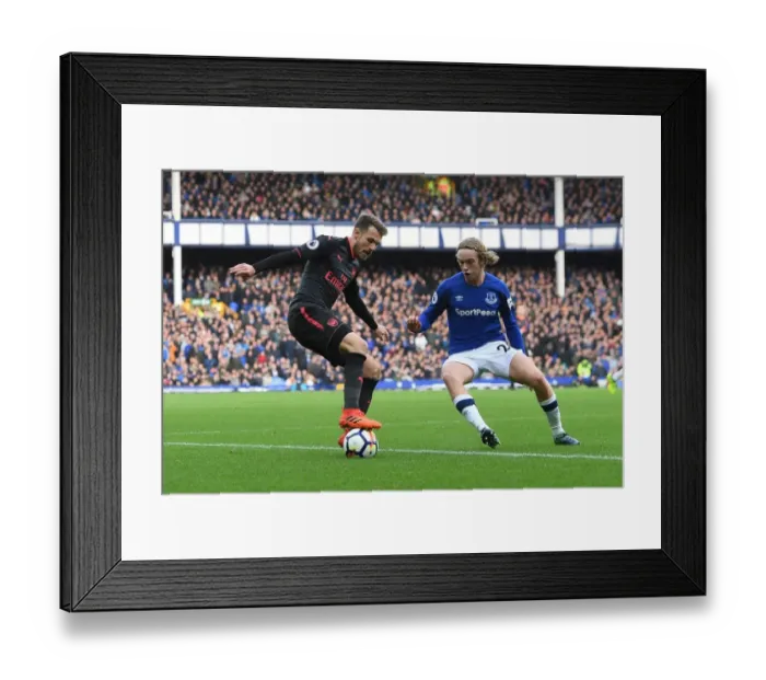 Framed Print : Clash at Goodison Park: Ramsey vs. Davies in Everton vs. Arsenal Premier League Showdown Framed Print : Clash at Goodison Park: Ramsey vs. Davies in Everton vs. Arsenal Premier League Showdown