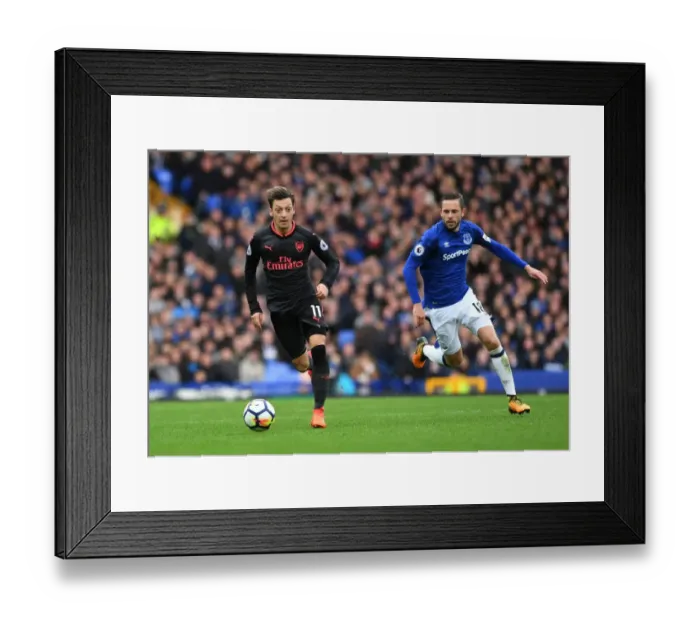 Framed Print : Ozil vs. Sigurdsson: A Premier League Battle at Goodison Park Framed Print : Ozil vs. Sigurdsson: A Premier League Battle at Goodison Park