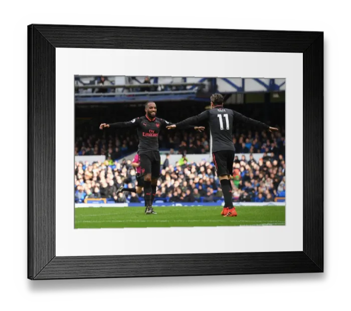 Framed Print : Lacazette and Ozil's Triumphant Moment: Arsenal's 3-Goal Spree vs Everton (2017-18) Framed Print : Lacazette and Ozil's Triumphant Moment: Arsenal's 3-Goal Spree vs Everton (2017-18)