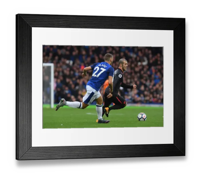 Framed Print : Wilshere vs Vlasic: Battle at Goodison Park - Everton vs Arsenal, Premier League 2017-18
