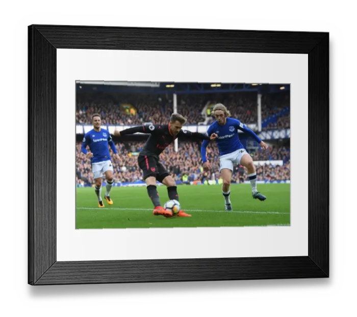 Framed Print : Clash at Goodison Park: Ramsey vs. Davies in Premier League Showdown Framed Print : Clash at Goodison Park: Ramsey vs. Davies in Premier League Showdown
