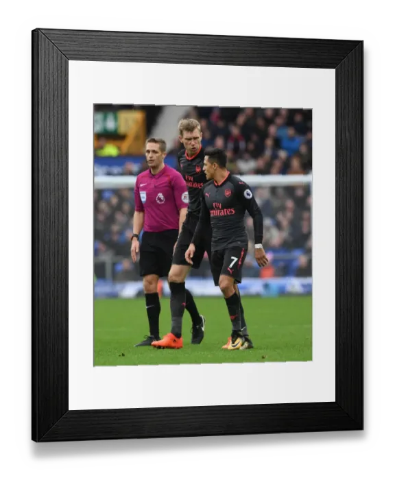 Framed Print : Per Mertesacker and Alexis Sanchez: Intense Focus During Everton vs. Arsenal Premier League Clash (2017-18)