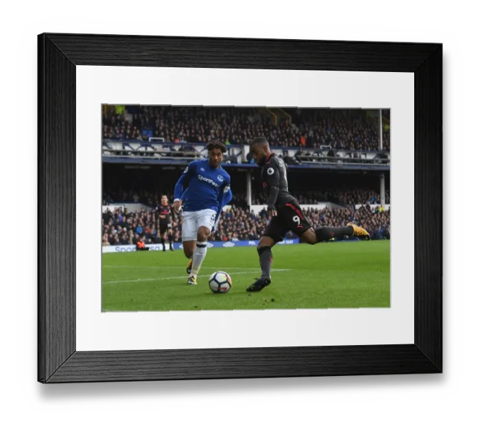 Framed Print : Lacazette vs. Williams: Intense Moment at Goodison Park - Everton vs. Arsenal, Premier League 2017-18