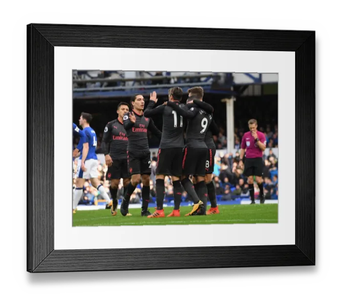 Framed Print : Triumphant Threesome: Lacazette, Ozil, and Bellerin Celebrate Arsenal's Goals Against Everton Framed Print : Triumphant Threesome: Lacazette, Ozil, and Bellerin Celebrate Arsenal's Goals Against Everton