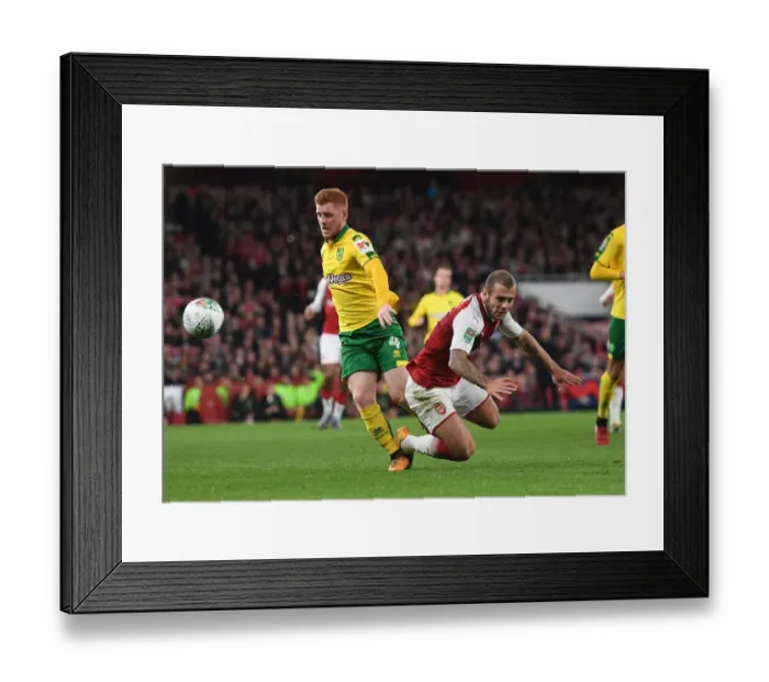 Framed Print : Arsenal's Jack Wilshere Fouled by Norwich's Harrison Reed in Carabao Cup Clash Framed Print : Arsenal's Jack Wilshere Fouled by Norwich's Harrison Reed in Carabao Cup Clash