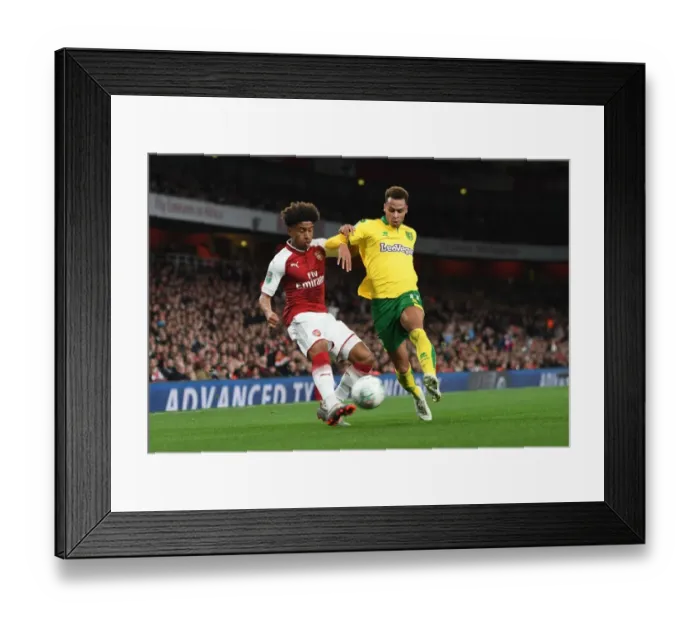 Framed Print : Reiss Nelson vs. Josh Murphy: A Carabao Cup Battle at Arsenal's Emirates Stadium Framed Print : Reiss Nelson vs. Josh Murphy: A Carabao Cup Battle at Arsenal's Emirates Stadium
