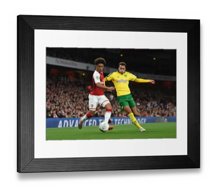 Framed Print : Arsenal's Reiss Nelson Clashes with Norwich's Josh Murphy in Carabao Cup Showdown Framed Print : Arsenal's Reiss Nelson Clashes with Norwich's Josh Murphy in Carabao Cup Showdown