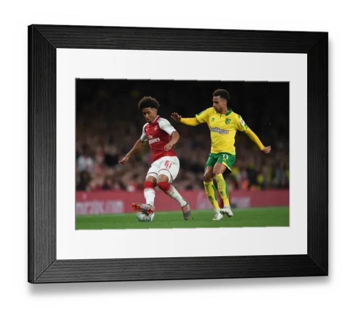Framed Print : Reiss Nelson vs. Josh Murphy: A Carabao Cup Showdown at Arsenal's Emirates Stadium Framed Print : Reiss Nelson vs. Josh Murphy: A Carabao Cup Showdown at Arsenal's Emirates Stadium