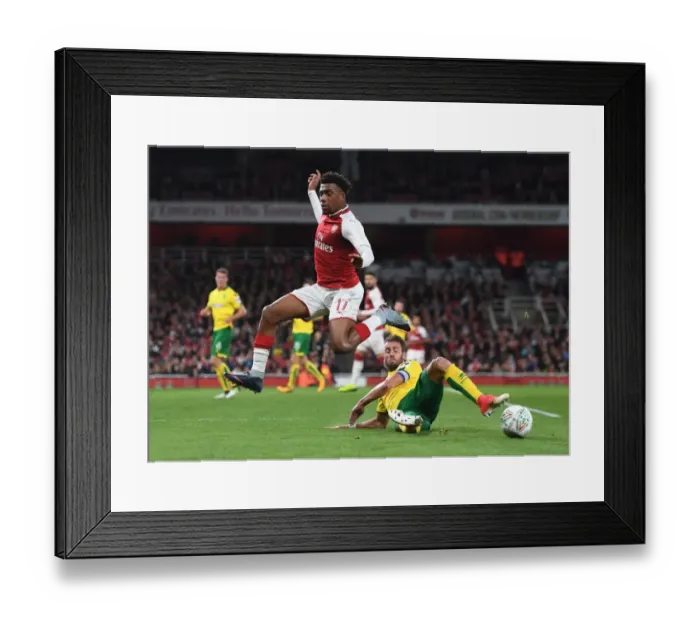 Framed Print : Arsenal's Alex Iwobi vs Norwich's Ivo Pinto: A Carabao Cup Showdown