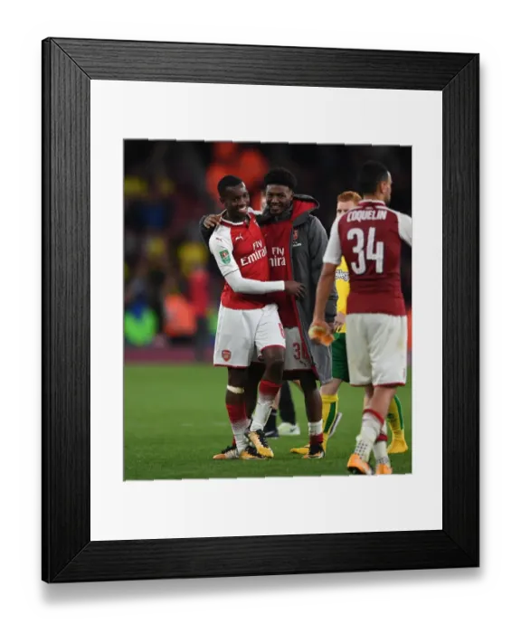 Framed Print : Arsenal's Maitland-Niles and Nketiah Embrace in Carabao Cup Victory Celebration Framed Print : Arsenal's Maitland-Niles and Nketiah Embrace in Carabao Cup Victory Celebration