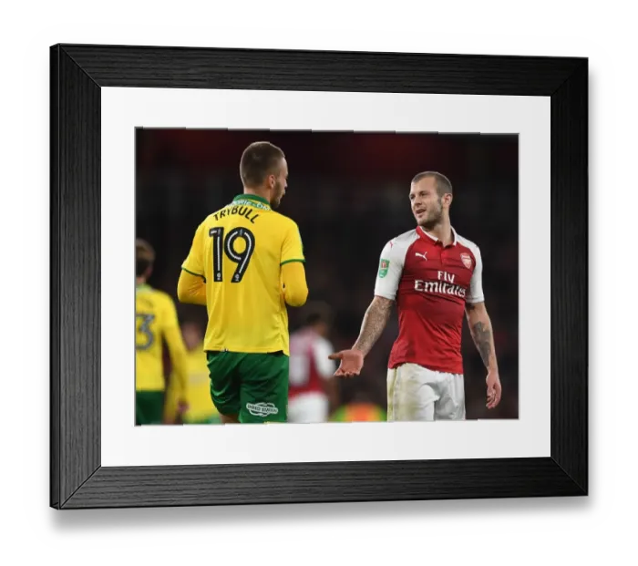 Framed Print : Arsenal's Jack Wilshere Confronts Norwich's Tom Trybull in Carabao Cup Clash Framed Print : Arsenal's Jack Wilshere Confronts Norwich's Tom Trybull in Carabao Cup Clash