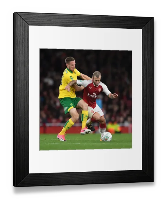 Framed Print : Arsenal's Jack Wilshere Clashes with Norwich's Marco Stiepermann in Carabao Cup Showdown