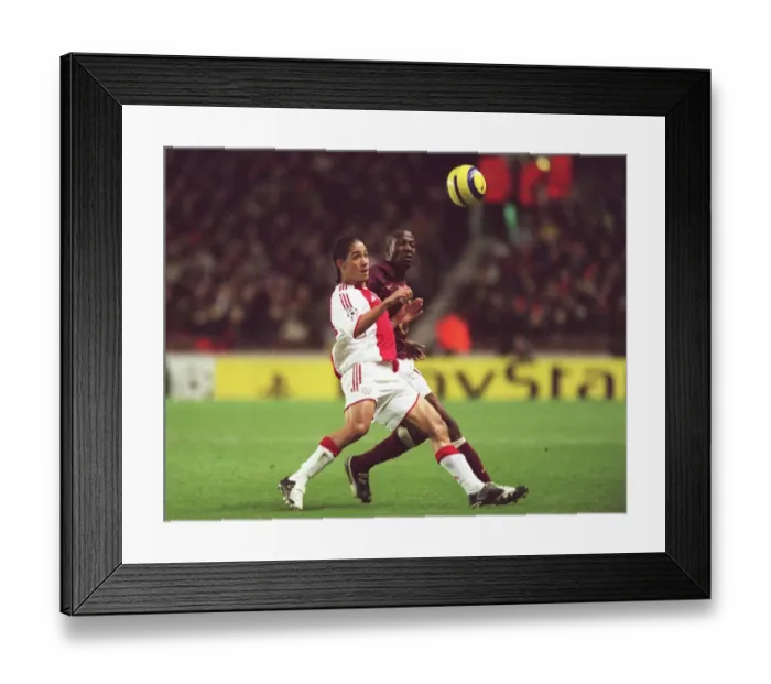 Framed Print : Lauren (Arsenal) Steven Pienaar (Ajax). Arsenal 0: 0 Ajax Framed Print : Lauren (Arsenal) Steven Pienaar (Ajax). Arsenal 0: 0 Ajax