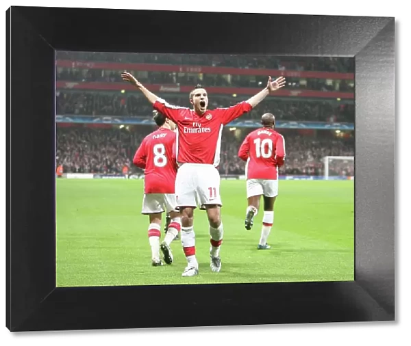 Robin van Persie celebrates scoring the Arsenal goal