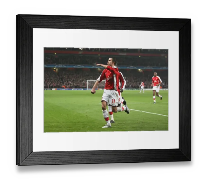 Framed Print : Van Persie's Euphoric Goal: Arsenal's Thrilling 1-0 Victory over AS Roma in the Champions League (2009)