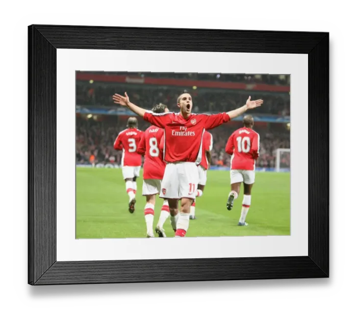 Framed Print : Van Persie's Thriller: Arsenal Takes the Lead over AS Roma in Champions League