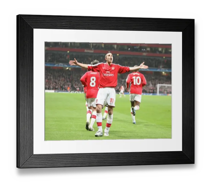 Framed Print : Van Persie's Thriller: Arsenal Takes the Lead Against AS Roma in Champions League