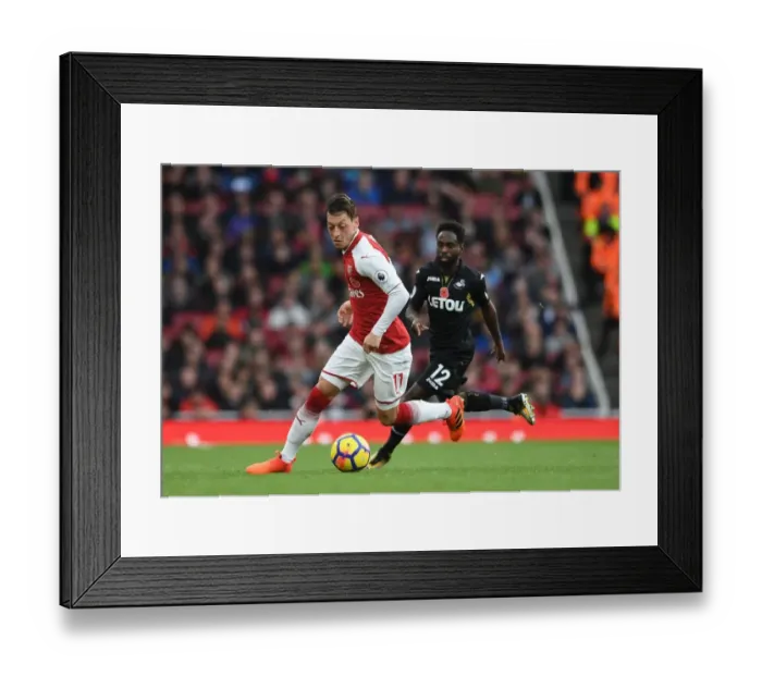 Framed Print : Mesut Ozil vs. Nathan Dyer: Clash at the Emirates - Arsenal v Swansea City, Premier League 2017-18 Framed Print : Mesut Ozil vs. Nathan Dyer: Clash at the Emirates - Arsenal v Swansea City, Premier League 2017-18