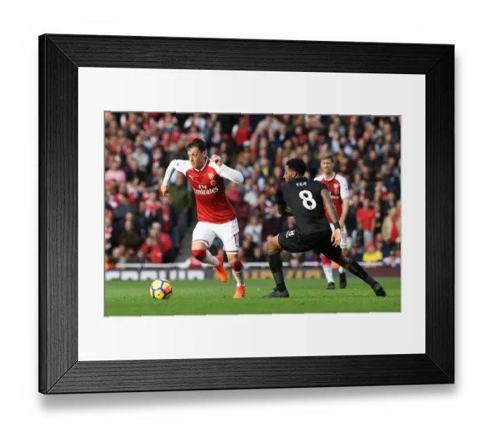 Framed Print : Mesut Ozil vs. Leroy Fer: A Midfield Battle - Arsenal vs. Swansea City Framed Print : Mesut Ozil vs. Leroy Fer: A Midfield Battle - Arsenal vs. Swansea City