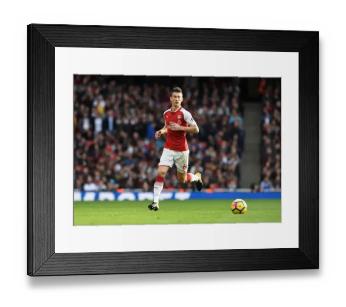 Framed Print : Arsenal's Koscielny in Action: Arsenal vs Swansea City (2017-18)