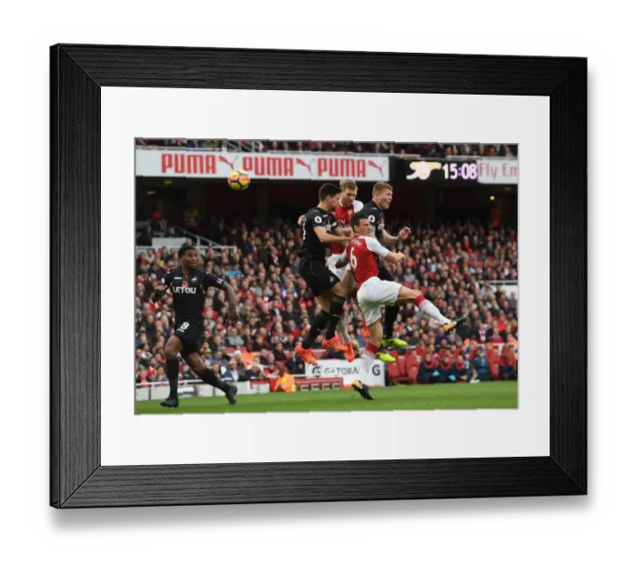 Framed Print : Arsenal vs Swansea: Koscielny and Mertesacker Clash with Fernandez and Mawson Framed Print : Arsenal vs Swansea: Koscielny and Mertesacker Clash with Fernandez and Mawson