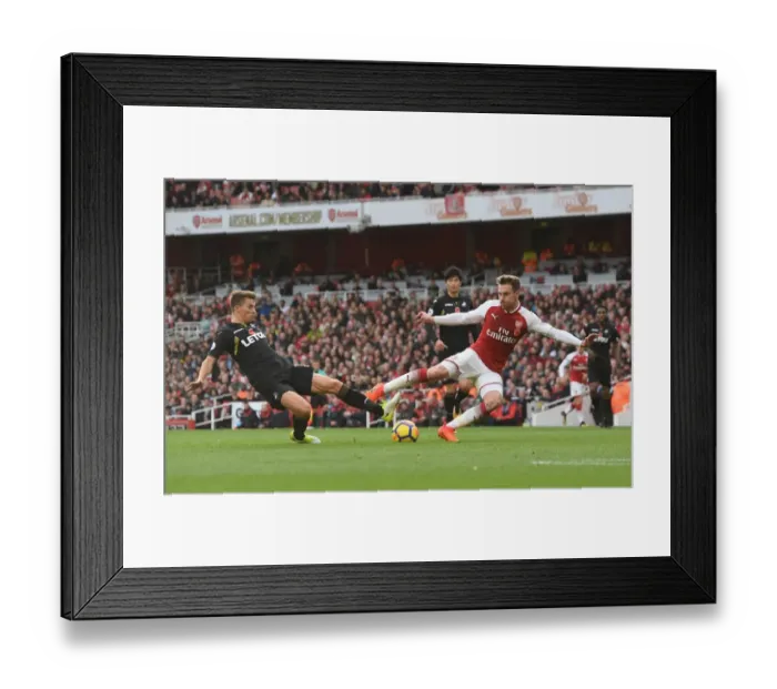 Framed Print : Arsenal's Aaron Ramsey Evades Swansea's Tom Carroll