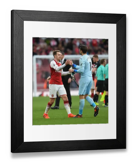 Framed Print : Arsenal's Aaron Ramsey and Swansea's Lukasz Fabianski Share a Moment After Match Framed Print : Arsenal's Aaron Ramsey and Swansea's Lukasz Fabianski Share a Moment After Match