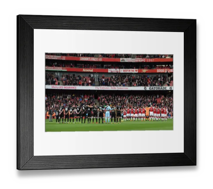 Framed Print : The Arsenal team have a minutes silence before the match. Arsenal 2: 1 Swansea City