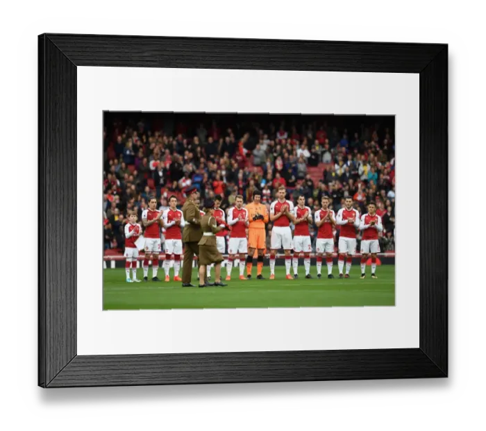 Framed Print : The Arsenal team clap the soldiers with the rememberance reef before the match. Arsenal 2 Framed Print : The Arsenal team clap the soldiers with the rememberance reef before the match. Arsenal 2