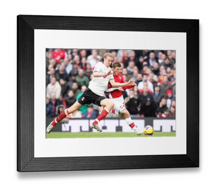 Framed Print : Andrej Arshavin (Arsenal) Brede Hangeland (Fulham) Framed Print : Andrej Arshavin (Arsenal) Brede Hangeland (Fulham)