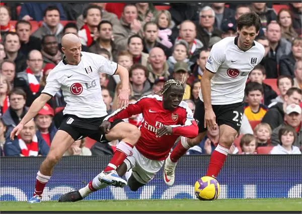 Bacary Sagna (Arsenal) Paul Konchesky & Clint Dempsey (Fulham)