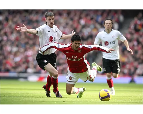 Carlos Vela (Arsenal) Chris Baird (Fulham)