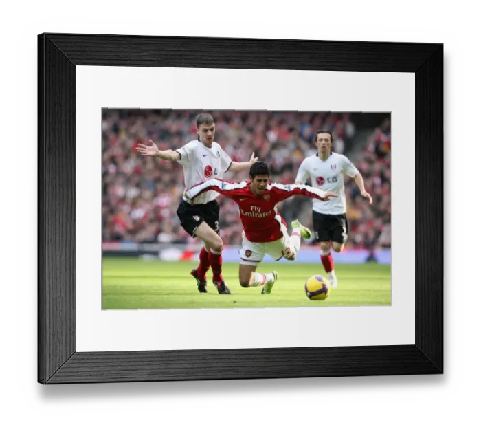 Framed Print : Carlos Vela (Arsenal) Chris Baird (Fulham) Framed Print : Carlos Vela (Arsenal) Chris Baird (Fulham)