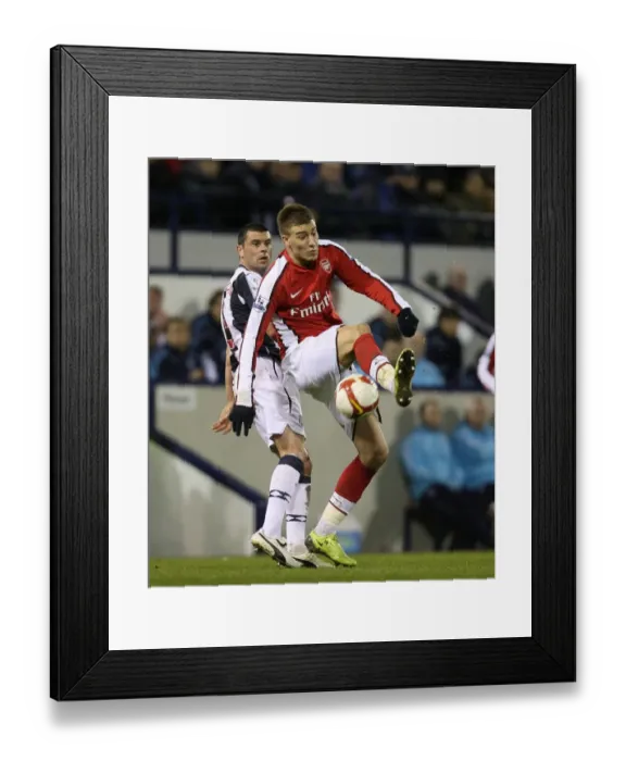 Framed Print : Nicklas Bendtner (Arsenal) Paul Robinson (West Brom) Framed Print : Nicklas Bendtner (Arsenal) Paul Robinson (West Brom)