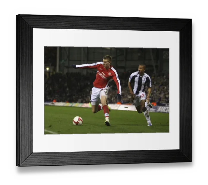 Framed Print : Nicklas Bendtner (Arsenal) Gianni Zuiverloon (West Brom) Framed Print : Nicklas Bendtner (Arsenal) Gianni Zuiverloon (West Brom)