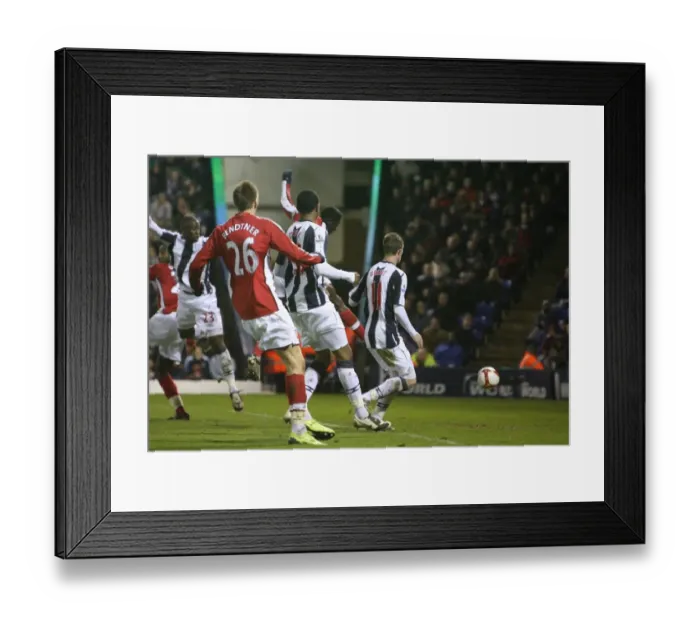 Framed Print : Kolo Toure heads past West Brom goalkeeper Scott Carson Framed Print : Kolo Toure heads past West Brom goalkeeper Scott Carson