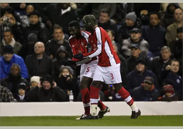 Kolo Toure celebrates scoring the 2nd Arsenal goal with Bacary Sagna