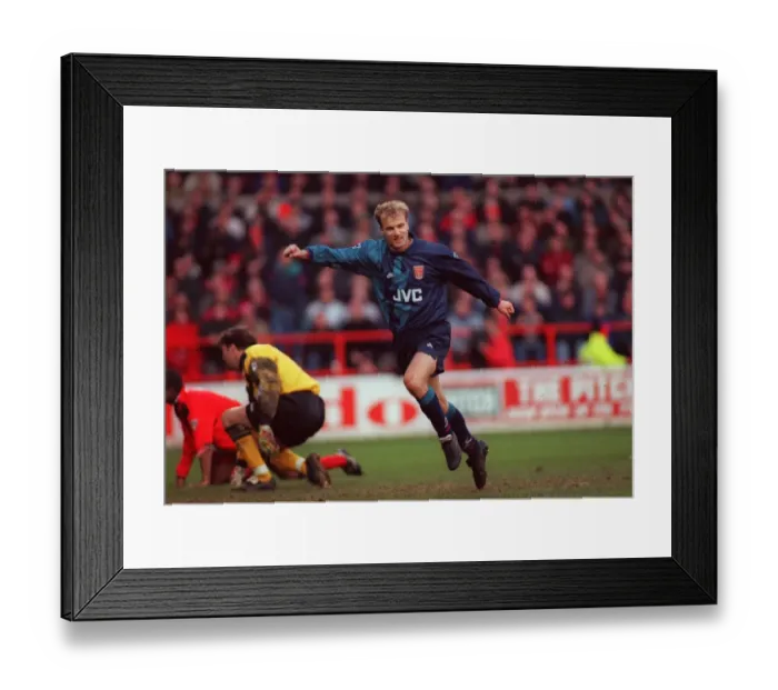 Framed Print : Dennis Bergkamp's Euphoric Goal Celebration for Arsenal Against Nottingham Forest