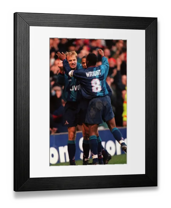 Framed Print : Dennis Bergkamp's Euphoric Goal Celebration with Ian Wright for Arsenal vs. Nottingham Forest Framed Print : Dennis Bergkamp's Euphoric Goal Celebration with Ian Wright for Arsenal vs. Nottingham Forest