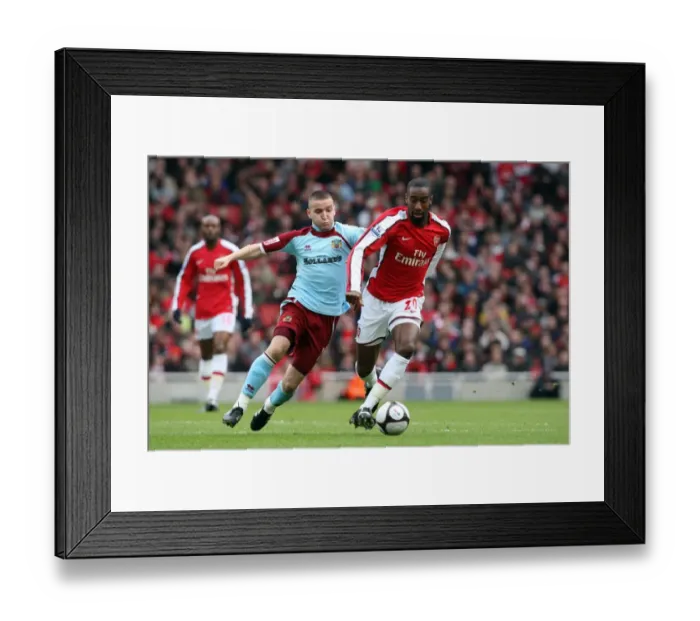 Framed Print : Johan Djourou (Arsenal) Martin Paterson (Burnley) Framed Print : Johan Djourou (Arsenal) Martin Paterson (Burnley)