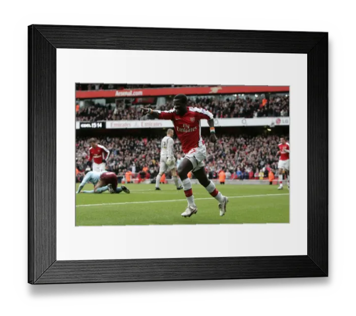 Framed Print : Emmanuel Eboue's Triumph: Arsenal's Thrilling Third Goal vs Burnley in FA Cup 5th Round