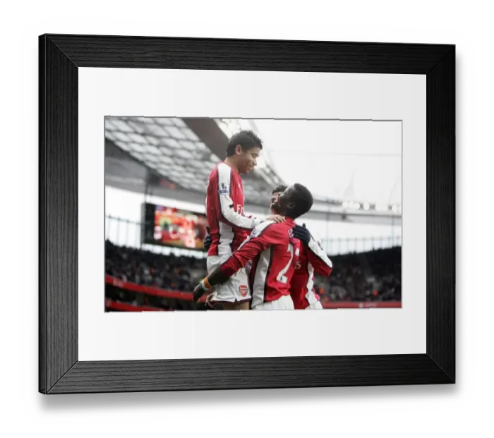 Framed Print : Eduardo, Eboue, and Vela: Triumphant Celebration of Arsenal's 3-0 FA Cup Victory over Burnley
