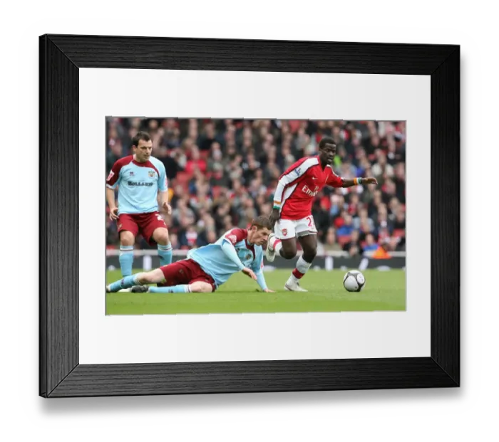Framed Print : Emmanuel Eboue (Arsenal) Christian Kalvenes (Burnley) Framed Print : Emmanuel Eboue (Arsenal) Christian Kalvenes (Burnley)