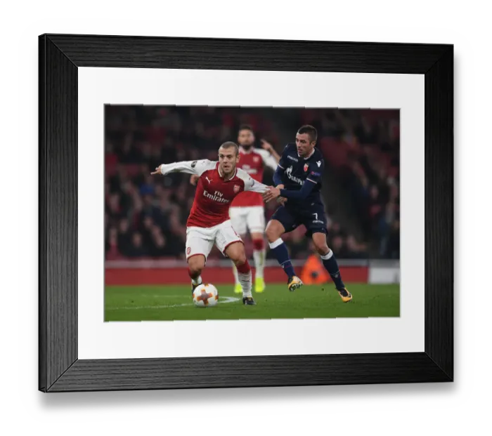 Framed Print : Clash of Midfield Titans: Jack Wilshere vs. Nenad Krsticic in Arsenal's Europa League Battle Framed Print : Clash of Midfield Titans: Jack Wilshere vs. Nenad Krsticic in Arsenal's Europa League Battle