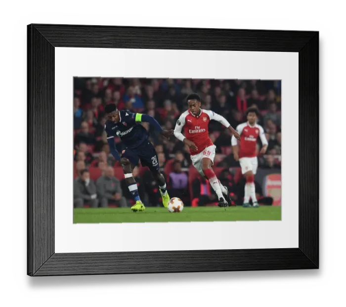 Framed Print : Clash of Midfielders: Joe Willock vs. Mitchell Donald - Arsenal's Europa League Battle Framed Print : Clash of Midfielders: Joe Willock vs. Mitchell Donald - Arsenal's Europa League Battle