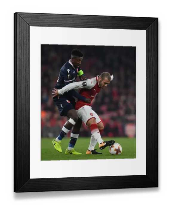 Framed Print : Arsenal's Jack Wilshere vs. Mitchell Donald: A Battle in the Arsenal FC vs. Crvena Zvezda UEFA Europa League Clash